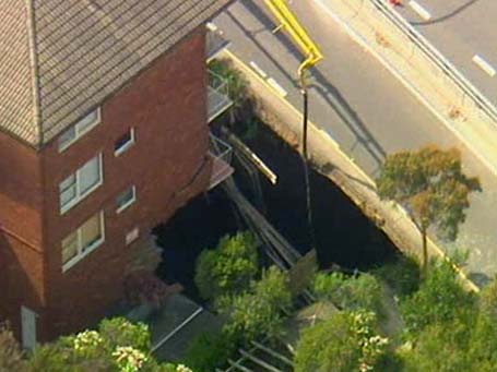 overhead view of hole and damaged unit block